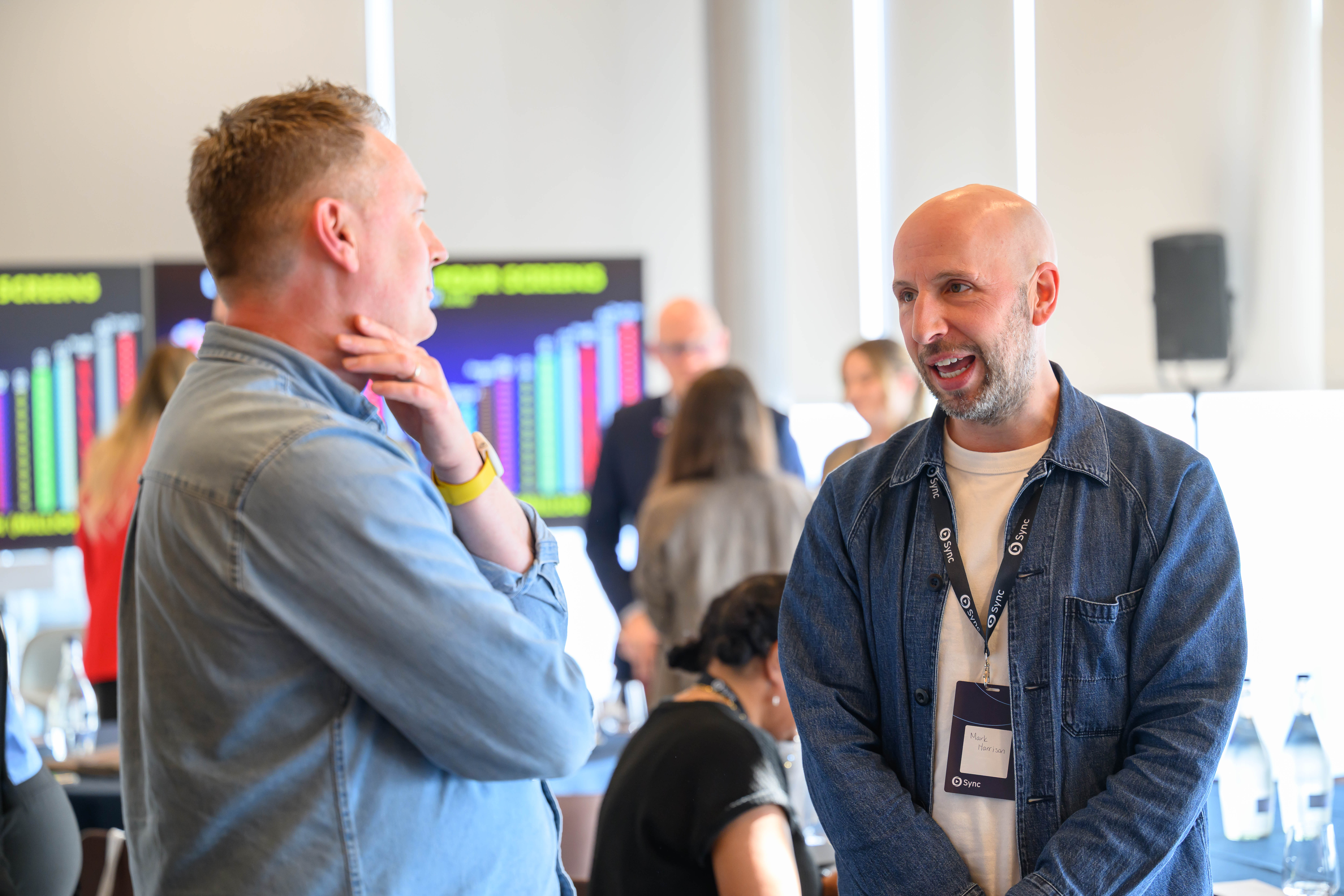 Delegates in conversation at Sync